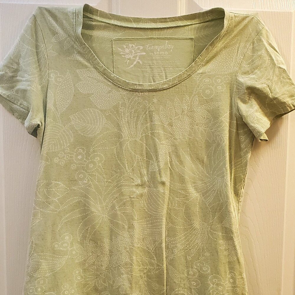 Women's pale green short sleeved shirt.